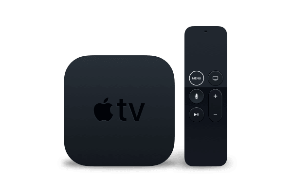 An Apple TV streaming device alongside its remote control.