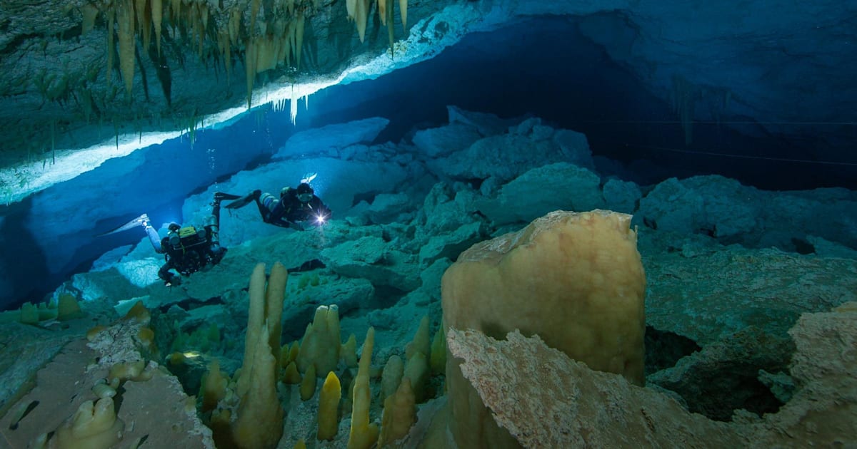 Watch 90 seconds of claustrophobic cave diving +video+