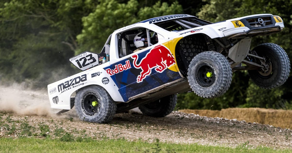 Mad Mike Whiddett rags his RUMBUL truck around Goodwood