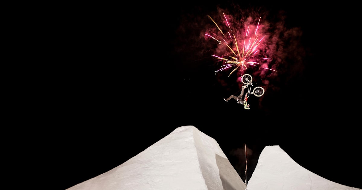 Shooting fireworks over an icy slopestyle bike course