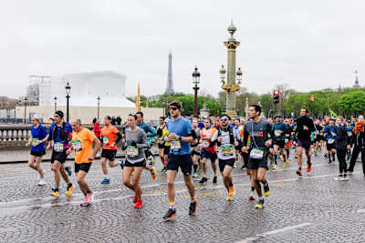 Join the 55,000 runners, pounding the Parisienne tarmac each year