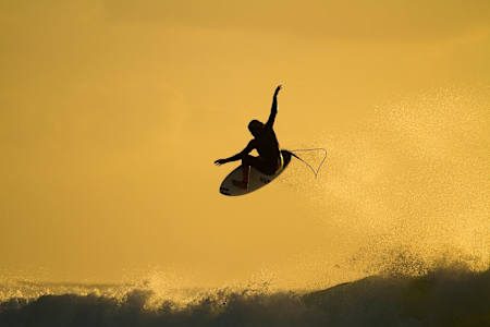 Surfer Jack Robinson performs an aerial at North Point in Western Australia.