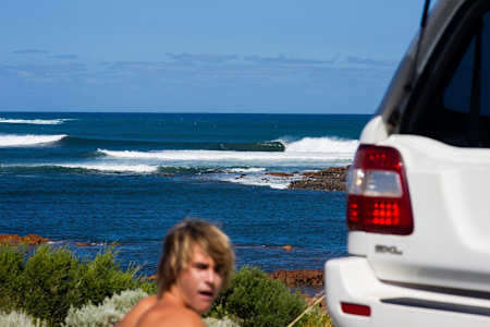 Surfer Jack Robinson prepares to surf at North Point in West Australia