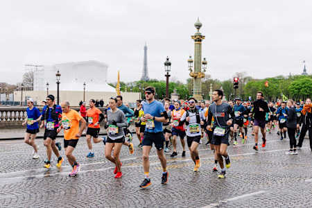 Join the 55,000 runners, pounding the Parisienne tarmac each year