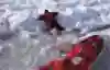 British adventurer Karl Bushby fights through the ice on the Bering Strait.