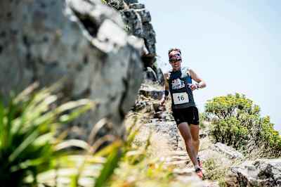 Ryan Sandes runs down a trail during the Red Bull Lion Heart event