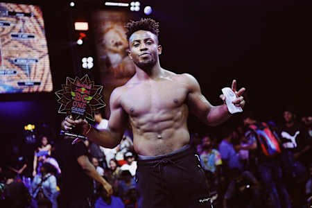 Kid Colombia poses with the trophy