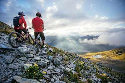 Claudio Caluori and Danny Macaskill look down the Davos valley, Switzerland.