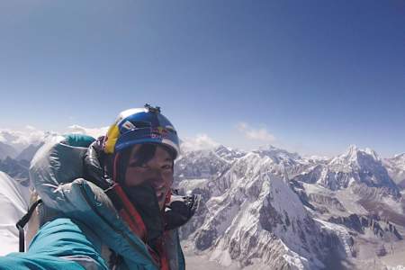 David Lama smiles at the camera after submitting Lunag Ri, a previously unconquered peak in Nepal.