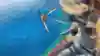 A screenshot of grappling from the video game Just Cause 3.