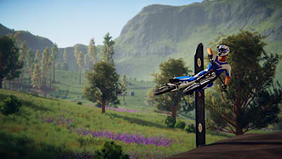 A screenshot from a jump in Descenders showing a bike doing a trick