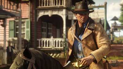 A promo screenshot of Arthur Morgan on horseback in Red Dead Redemption 2