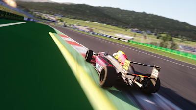 Using the curbing on exit of turn one is key but risky. Jumping the yellow curbing can end in a penalty or a big crash.
