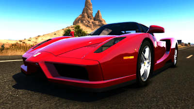 A screenshot of an iconic red Ferrari Enzo in Test Drive Unlimited 2.