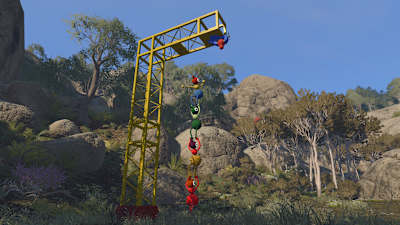 Screenshot aus Big Walk zeigt eine Gruppe beim Lösen eines Rätsels.