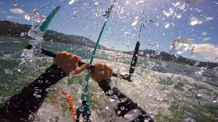 An image of a kitesurfer in action on the water. 