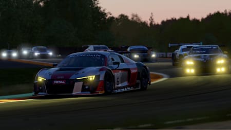 An Audi R8 racing at night in Project CARS 2