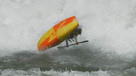 Sadat Kawawa rides the White Nile rapids in a kayak.