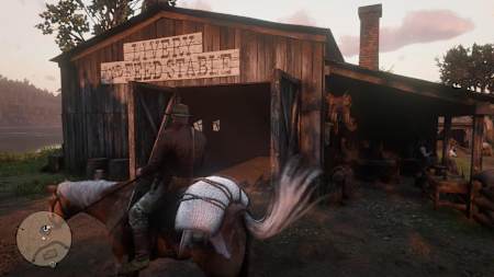 Una captura de pantalla de un establo de Red Dead Redemption 2.