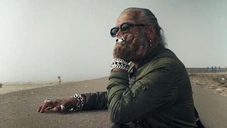 A still photo of legendary Berghain doorman Sven Marquardt taken from a new documentary called Berlin Bouncer.