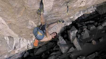 Adam Ondra performing on a climb in Flatanger, Norway.
