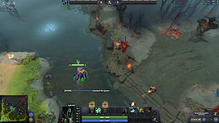An observer ward is placed near the runes in the mid lane of a Dota 2 map.