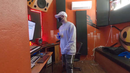 William Manzano Serrano, aka Yartzi, in the studio recording a track for Check Your DMs.