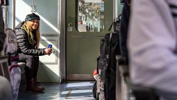 Michelle Parker rides the train in Myoko Kogen, Japan on February 3, 2018.