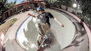 Willy Lara locks a frontside nosegrind in a backyard pool