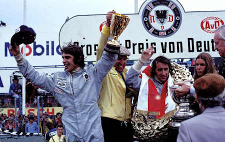 Jackie Stewart and François Cevert celebrate at the German Grand Prix.