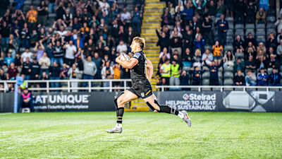 Alex Hearle races away to score his hat-trick try against Sale Sharks