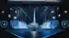 An image of the LoL Worlds stage and trophy