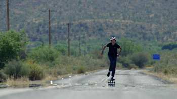Jagger Eaton is pictured skating along a hot road in Pushing Forward S2