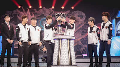 A photo of SK Telecom T1 lifting the Worlds trophy during the 2017 Worlds Opening Ceremony