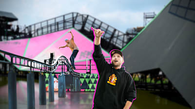 A man excitedly cheers while a skater performs a balance trick on a wavy rail on a colourful obstacle course for Kasso Fest Skate & Sound.
