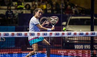 Ariana Sánchez attacking with a backhand volley in a World Padel Tour match.