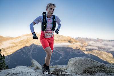 Dominik Tabor running in the mountains.