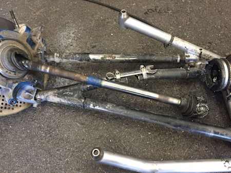 Note the spanner holding the suspension together