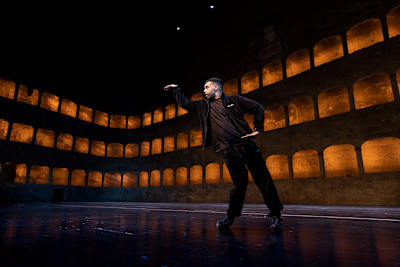 Professional tutting dancer Nelson pictured performing on stage at the Felsenreitschule in Salzburg, Austria.