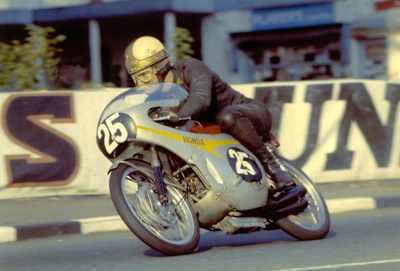 Isle of Man legends, including Mike Hailwood, Joey Dunlop, John McGuinness, Ari Vatanen and Mark Higgins.