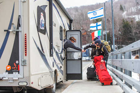 Zeb Powell picks up Miles Fallon and Benny Milam near Loon Mountain Resort during the Red Bull Slide In Tour 2020. 