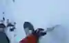 Xavier de le Rue using an ice axe on a steep mountain.