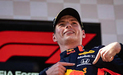 Race winner Max Verstappen celebrates on the podium during the F1 Grand Prix of Austria at Red Bull Ring in Spielberg, Austria.