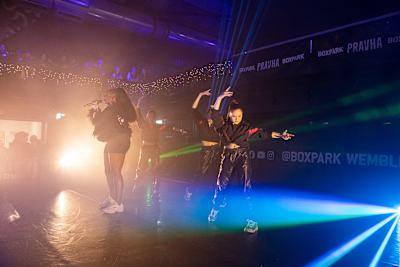 A photo of grime artist MC Lioness performing with dancers as part of the grime ballet, London Sketchbook.