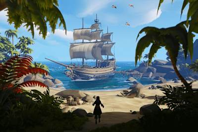 A ship in a cove on a tropical island in Sea of Thieves by Rare Games.