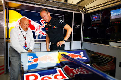 Sir Stirling Moss in the Red Bull Racing garage with Team Manager Jonathan Wheatley at the 2010 British Formula 1 Grand Prix