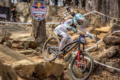Aletha Ostgaard, rides through the rock slab section at the Red Bull Tennessee National at Windrock Bike Park in Tennessee, USA on March 21, 2026.