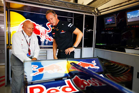 Sir Stirling Moss in the Red Bull Racing garage with Team Manager Jonathan Wheatley at the 2010 British Formula 1 Grand Prix