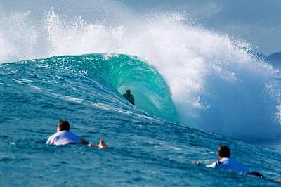 Taj Burrow rides the tube at Burleigh Heads