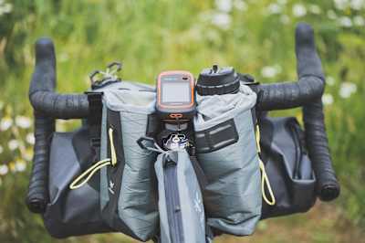 This handlebar has storage attached to the front and back.